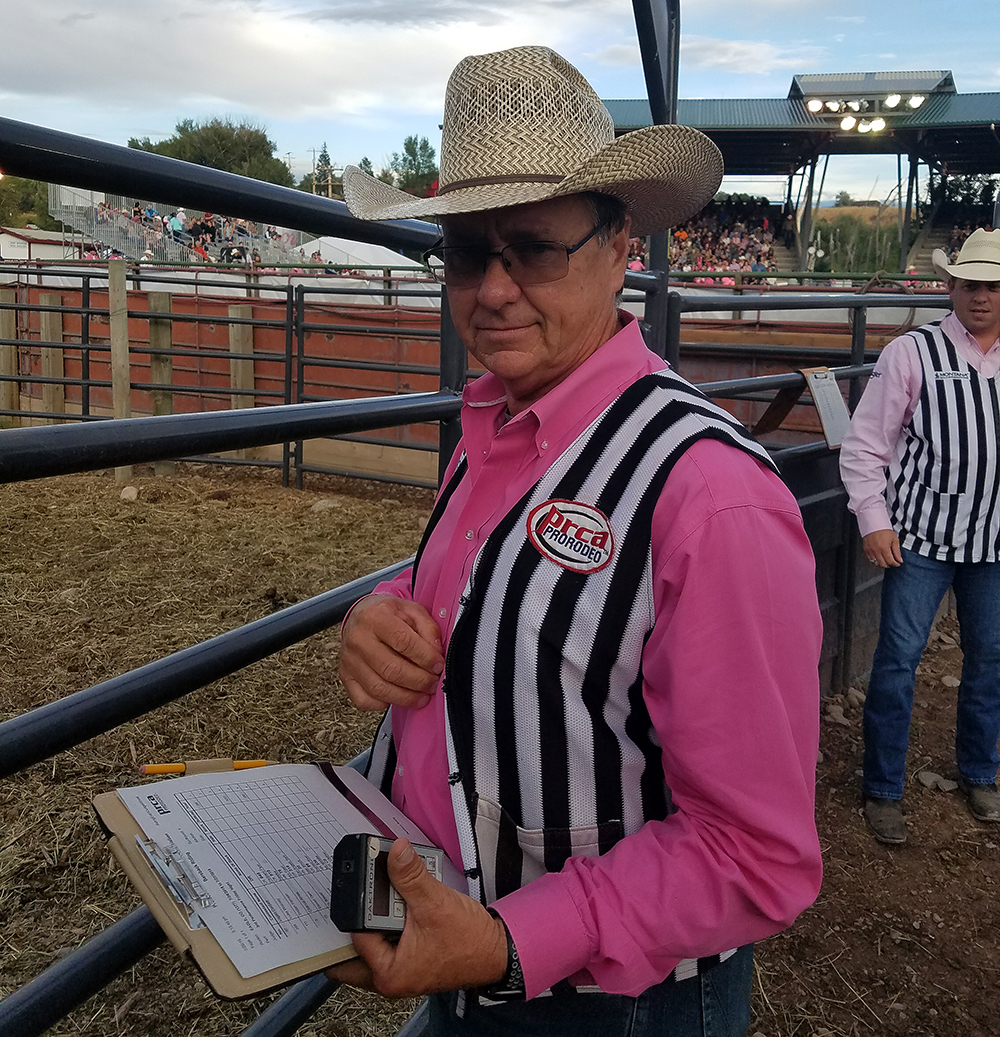 John Gwatney and his wife are contract personnel for the Eagle County Fair and Rodeo. John, who serves as the chute boss, had to step in as a ProRodeo official during the third performance of this year's event after two judges were delayed by a landslide west of Eagle, Colorado.