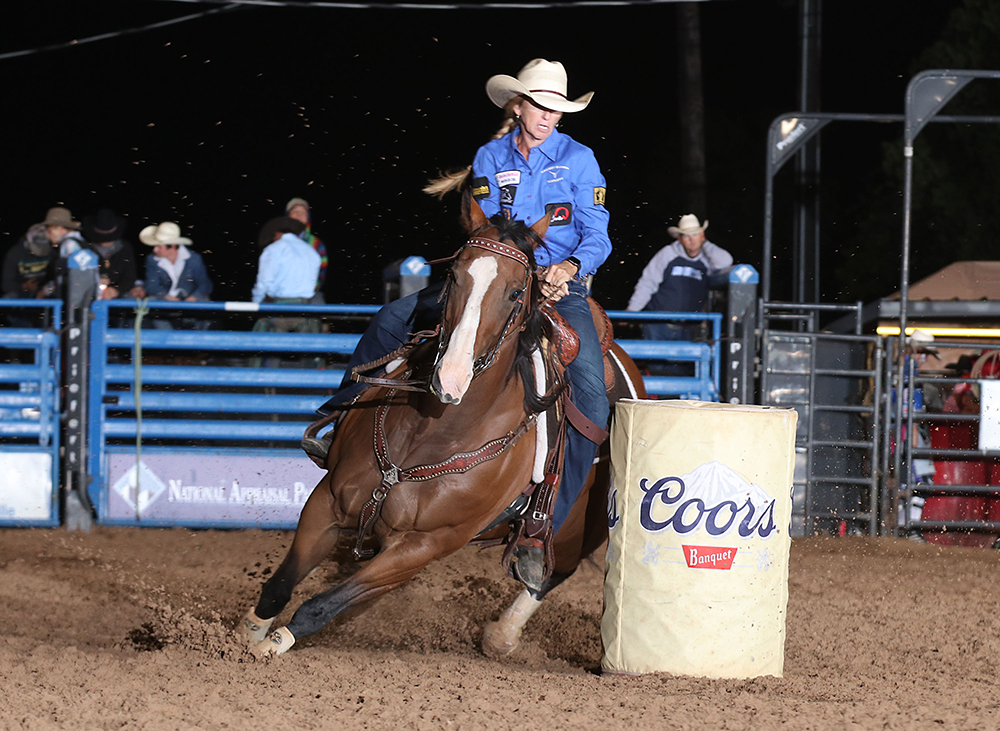 Cheyenne Wimberley finished second at Bellville's rodeo after posting a 15.26-second run Saturday night. She will return to the National Finals Rodeo after a 21-year hiatus. (PHOTO BY PEGGY GANDER)