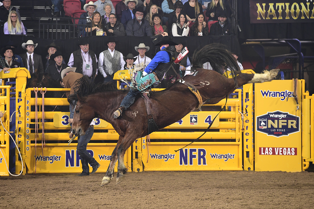 Tanner Aus rides Pickett Pro Rodeo's Top Egyptian for 88.5 points to place for the sixth time at the National Finals Rodeo. He earned just shy of $92,000 in Vegas over 10 days. (PRCA PRORODEO PHOTO BY JAMES PHIFER)