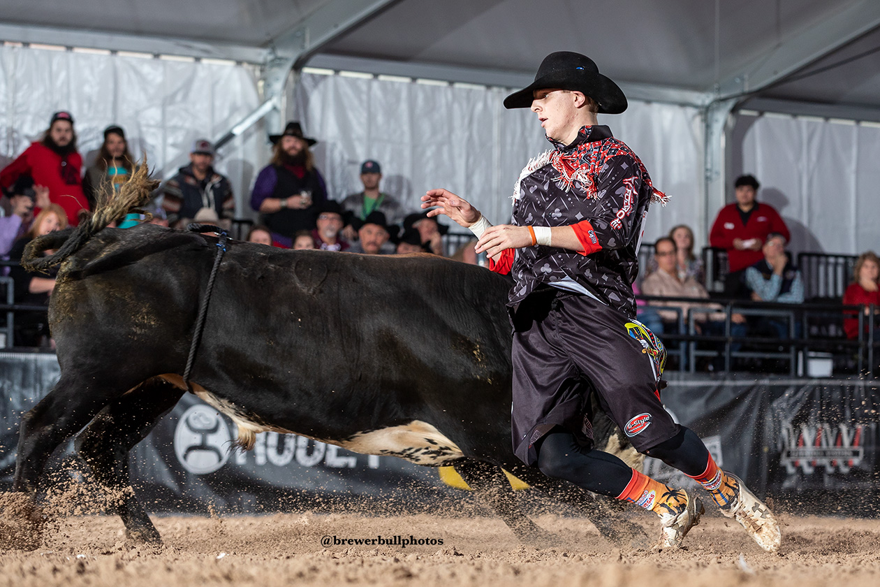 Cade Gibson allows the bull to slide by during his bullfight Tuesday in the second day of the FlexFit Preliminary Rounds of the Bullfighters Only Las Vegas Championship at the Tropicana Las Vegas. (PHOTO BY TODD BREWER)