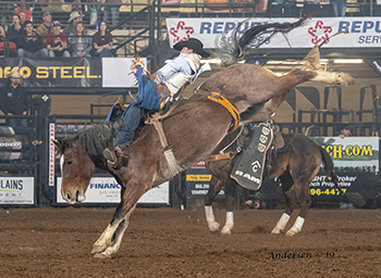 Kody Lamb rides Pete Carr's Pink Cadillac for 86.5 points on Wednesday night and will advance to Friday's championship round of the San Angelo Stock Show and Rodeo. (PHOTO BY RIC ANDERSEN)