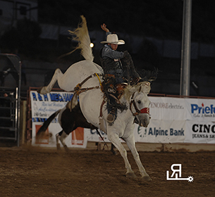 Bradley Harter rides Pete Carr's Another Grey and has the saddle bronc riding lead at the Eagle County Fair and Rodeo. (PHOTO BY ROBBY FREEMAN)