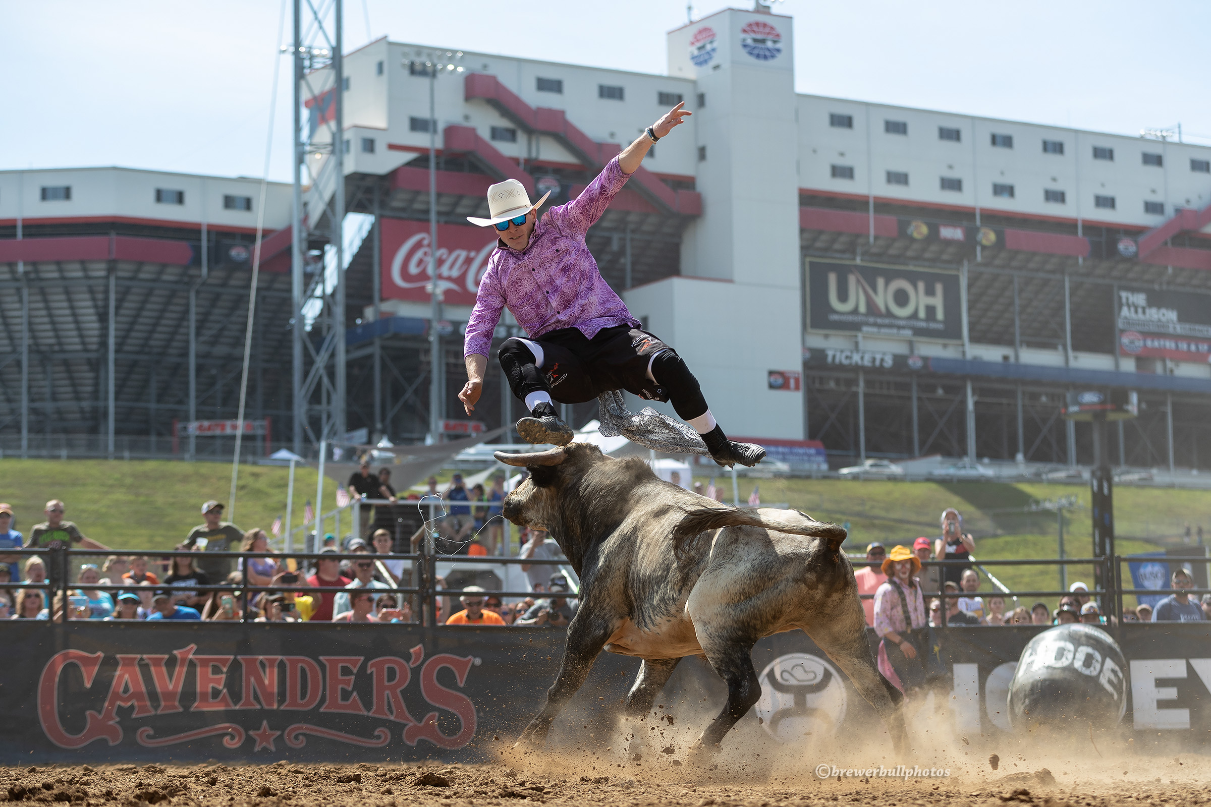 With the Bristol Motor Speedway in the background, Kris Furr leaps over his bull during his Bullfighters Only Speedway Series event title in the northeastern Tennessee community. (PHOTO BY TODD BREWER)