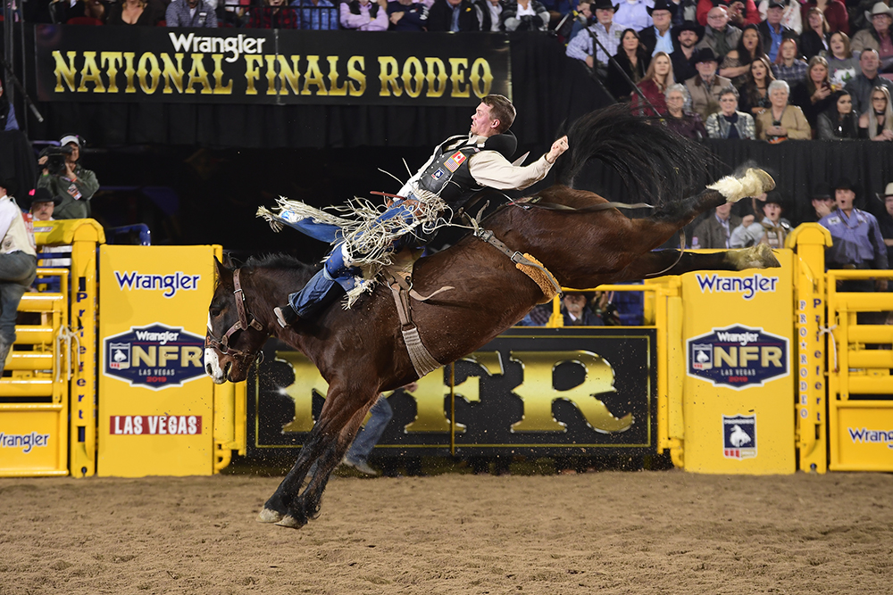 Orin Larsen rides Big Stone Rodeo's Mayhem for 90 points to finish as the runner-up in Wednesday's seventh round of the National Finals Rodeo. (PRCA PRORODEO PHOTO BY JAMES PHIFER)