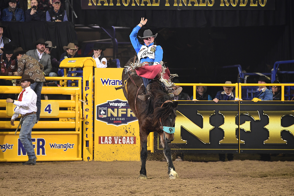 Tim O'Connell rides Pickett Pro Rodeo's Scarlet Fever for 87.5 points Wednesday night to finish tied for fourth in the seventh round of the National Finals Rodeo. (PRCA PRORODEO PHOTO BY JAMES PHIFER)