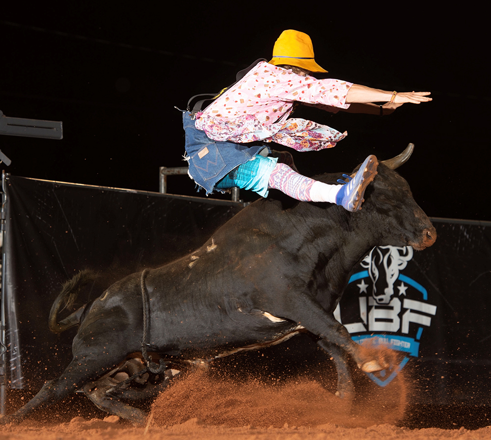 Justin Josey has a bull pass under him during a recent Ultimate Bullfighters competition. Josey, the No. 2 man in the UBF, will be part of the Ultimate Bullfighters Challenge presented by Pump & Pantry, which takes place at 8 p.m. Friday and Saturday. (PHOTO BY CLICK THOMPSON)