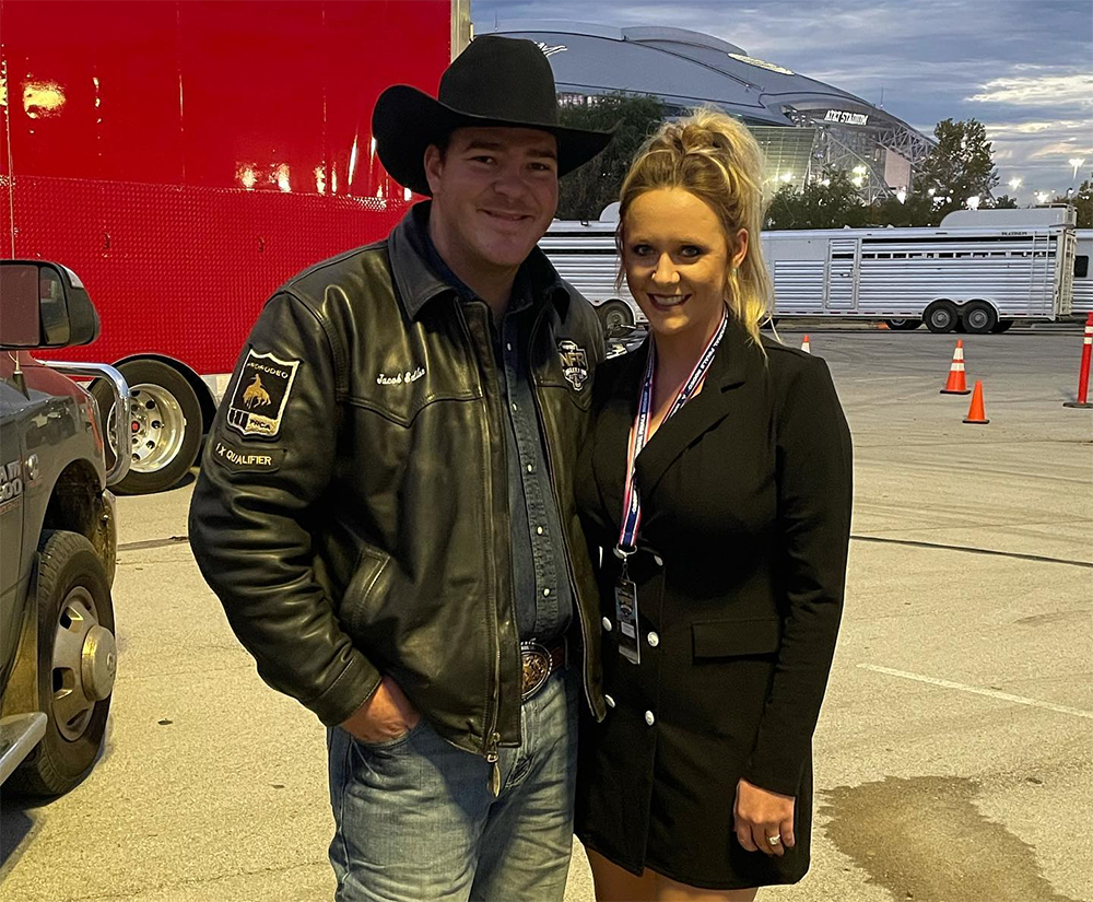 Jacob Edler and his fiance, Moriah, pose outside Globe Life Field before Saturday's third round of the National Finals Rodeo. (PHOTO COURTESY OF MORIAH GLAUS' FACEBOOK PAGE)