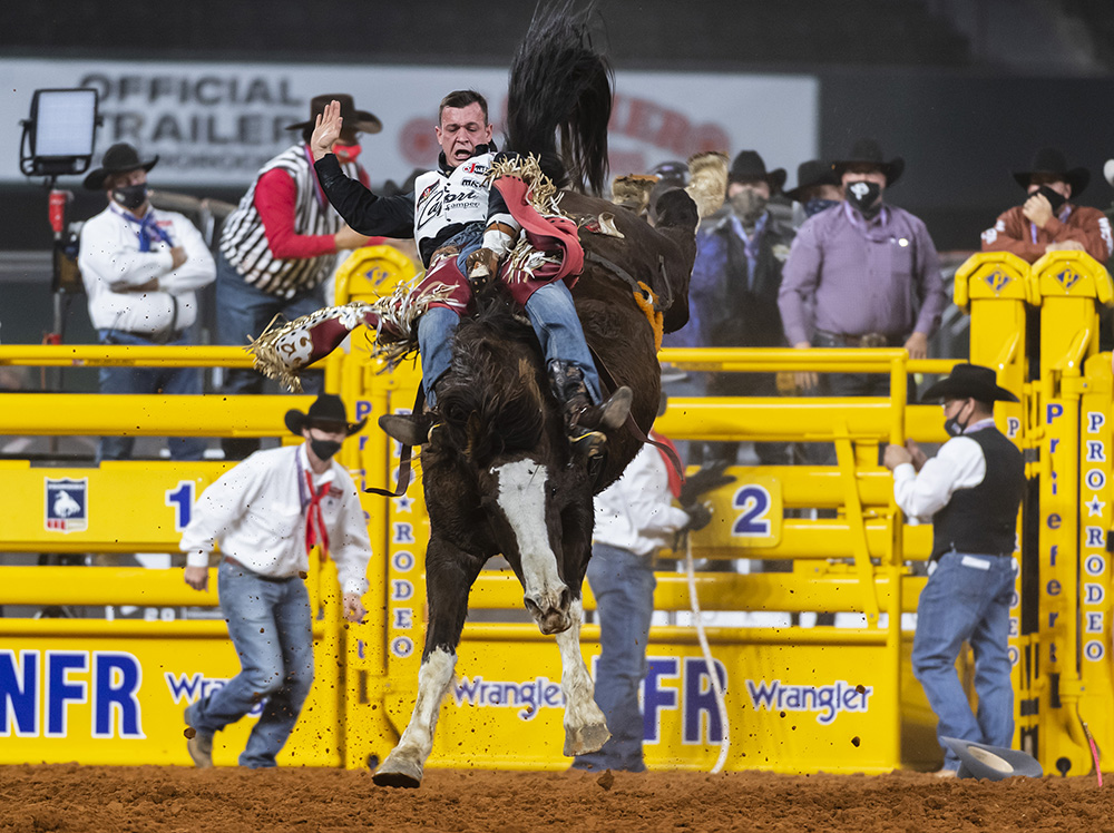 Tim O'Connell rides J Bar J's Blessed Assurance for 85.5 points to place in Tuesday's sixth round of the National Finals Rodeo. (PHOTO BY JAMES PHIFER)