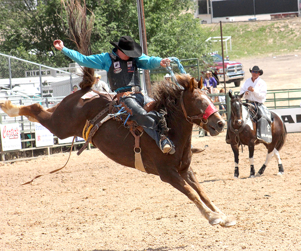 Jake Finlay, the 2018 college national champion saddle bronc rider from Oklahoma Panhandle State, competes at the 2016 Guymon Pioneer Days Rodeo during his rookie season in ProRodeo.